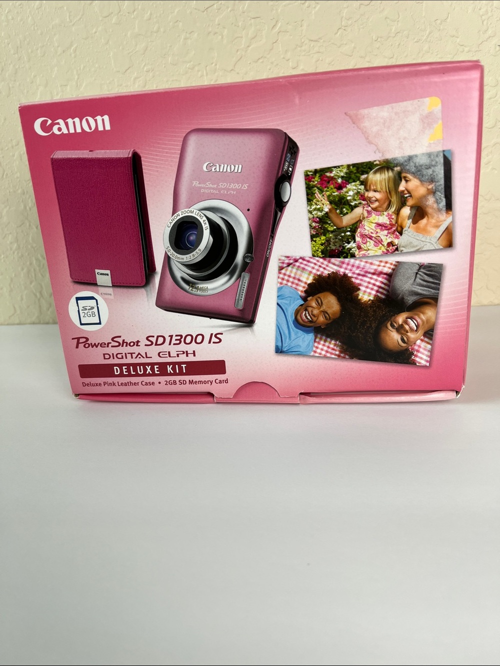Canon PowerShot SD1300 IS Digital ELPH 
Deluxe Camera Kit in Pink